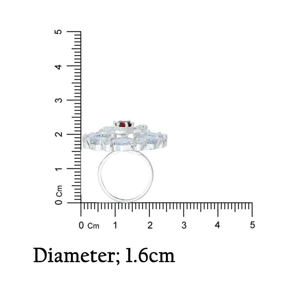 Beautiful flower-shaped silver ring adorned with a striking red gemstone for young girls.