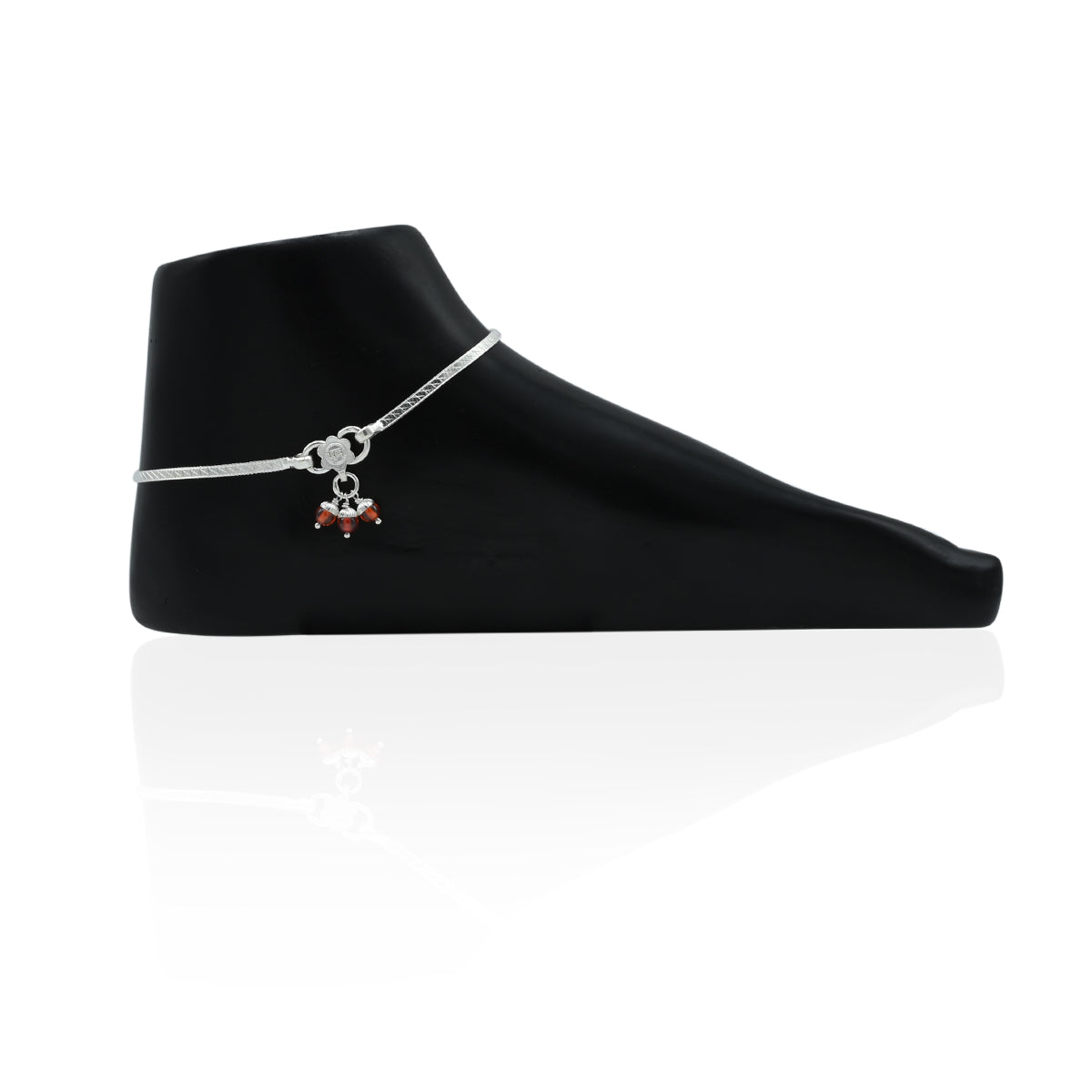 Charming silver payal adorned with three bright orange beads for a bold look.