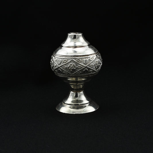 Handcrafted silver item designed for home Pooja and devotion