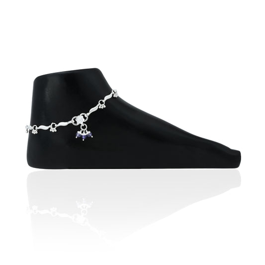 Elegant silver anklet with spinning beads for a dynamic, chic design