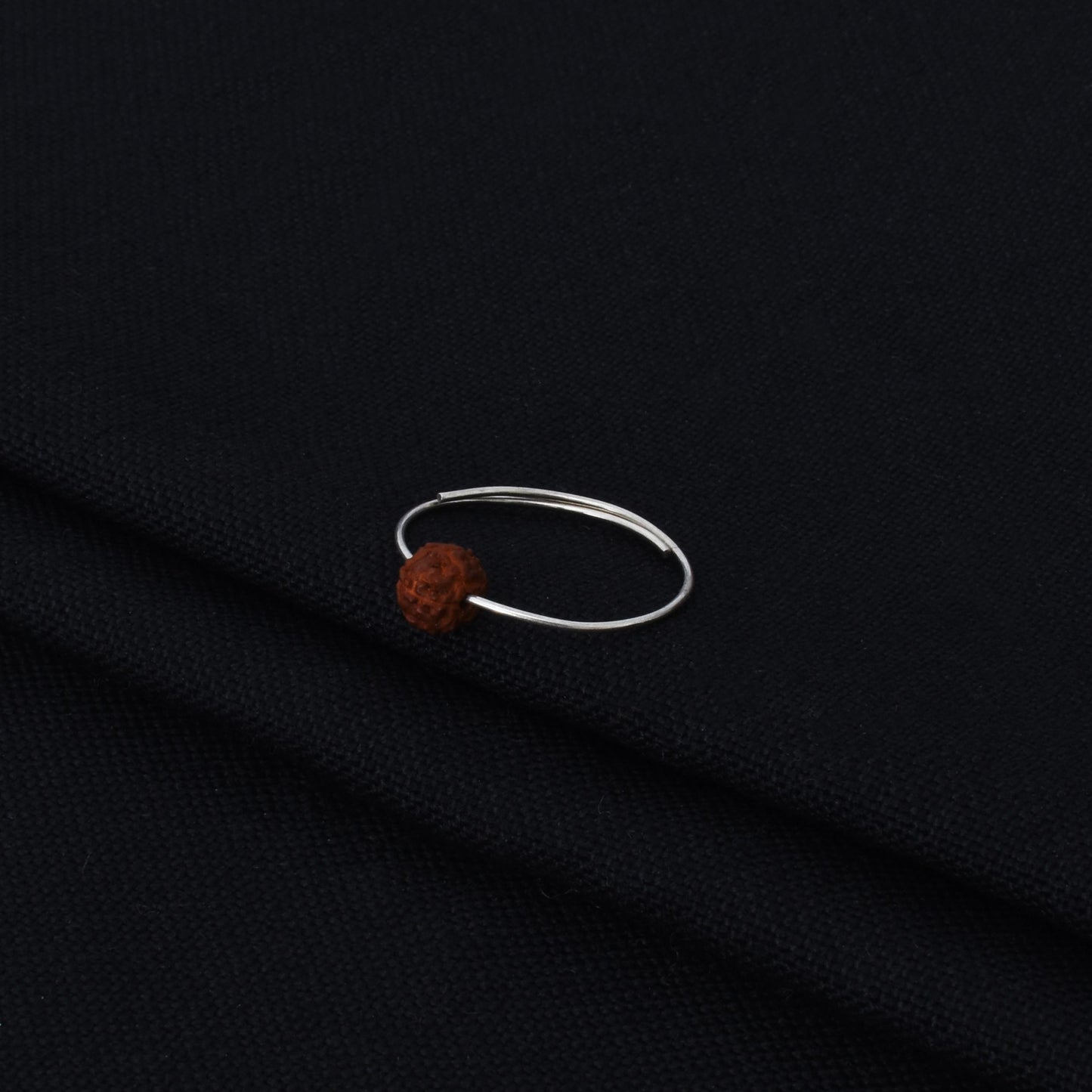 Stylish silver ring for girls showcasing a beautiful Rudraksha for a meaningful touch