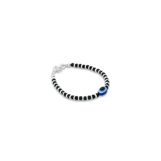 Stylish silver bracelet with an oval-shaped evil eye and black beads for protection