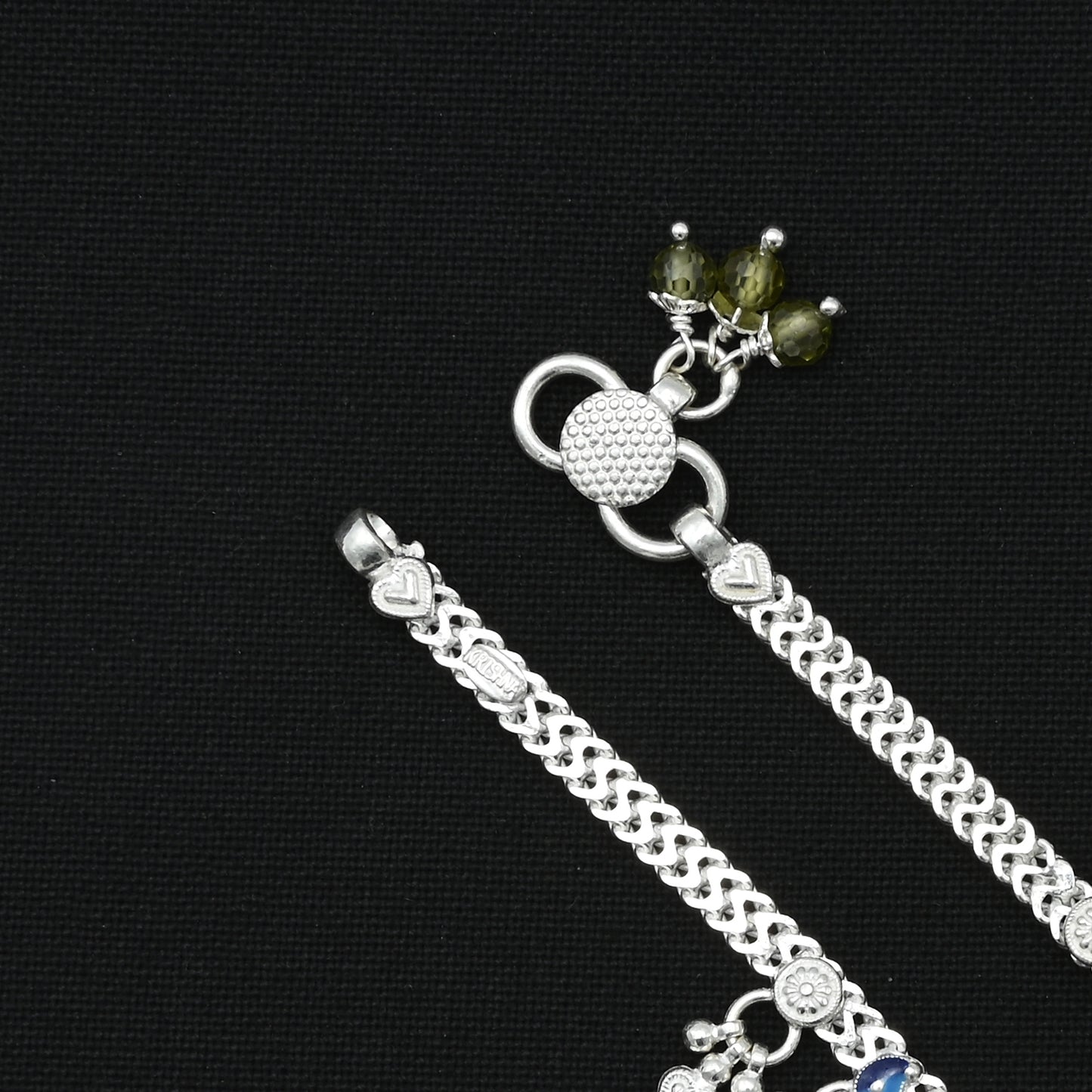 Classical silver anklet adorned with peacock-inspired bead details