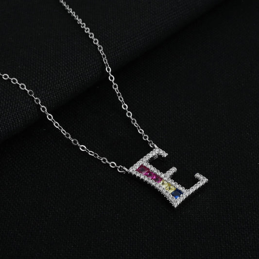 Elegant silver chain featuring a personalized 'E' pendant.
