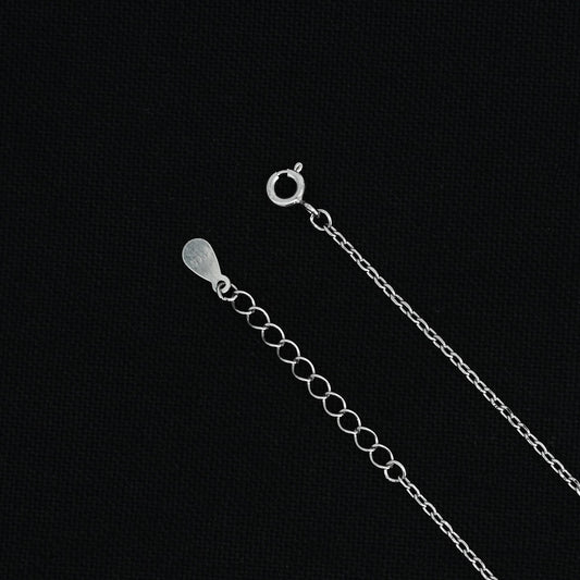 Trendy sterling silver necklace featuring star-shaped charms.