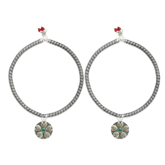 Elegant silver kada for girls with a coiled sunflower motif.