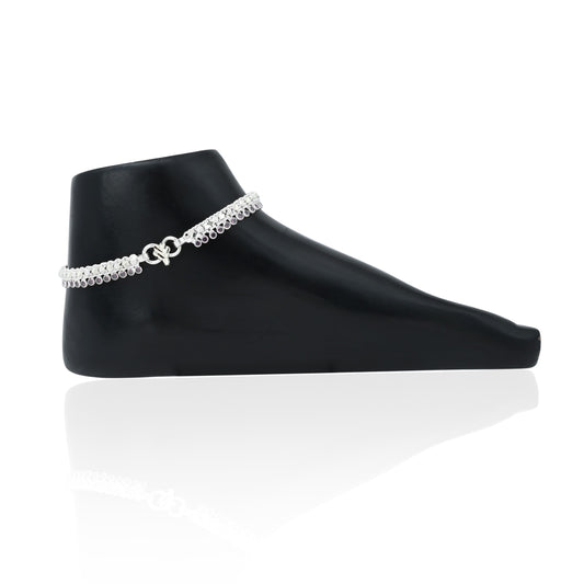 Elegant silver anklet adorned with ethically sourced gems for a refined and responsible touch