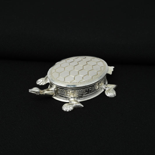 Handcrafted silver Sindoor box featuring a beautiful turtle motif for bridal rituals