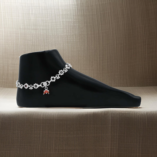 Elegant silver payal with a vintage floral motif, offering a classic and sophisticated style.