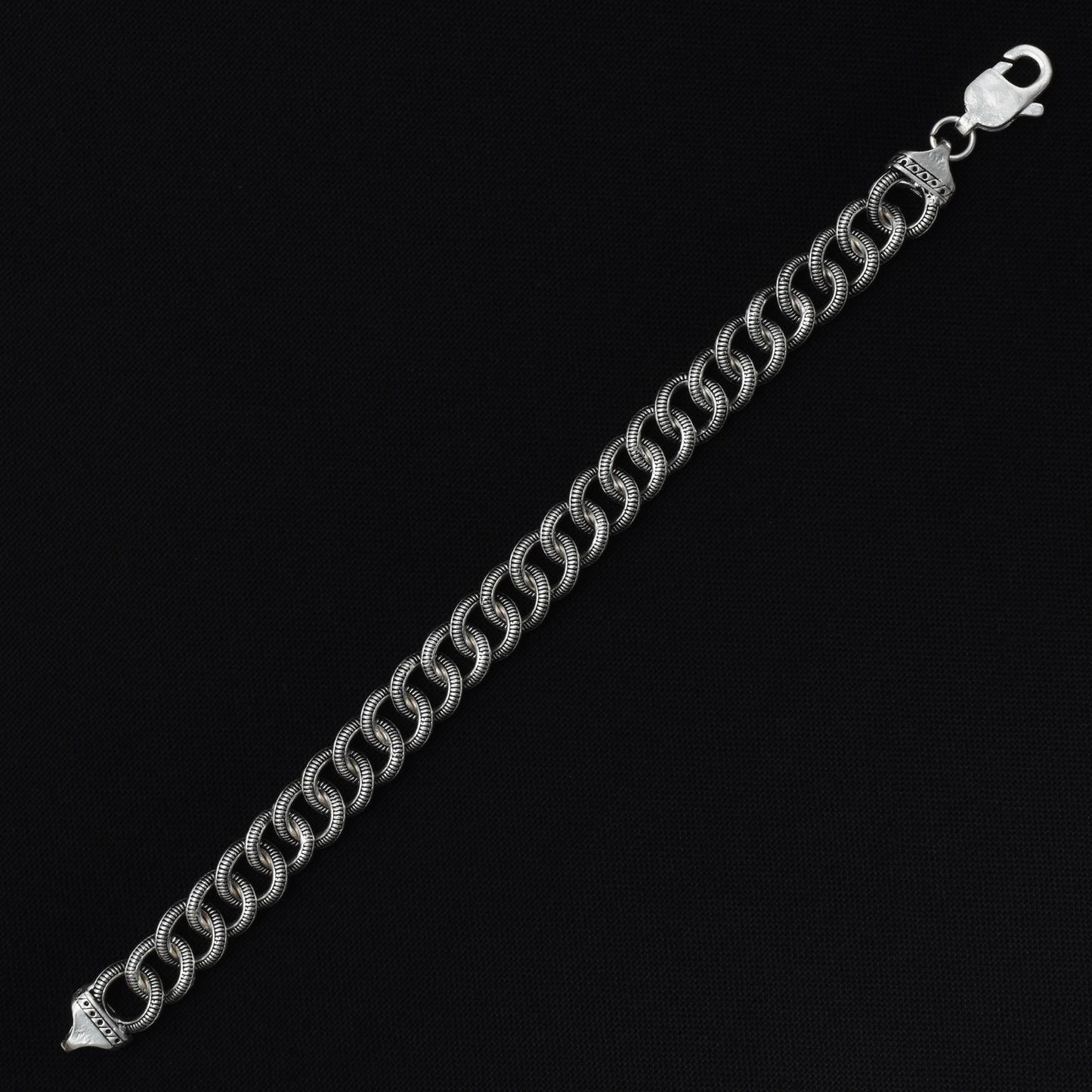 Stylish silver bracelet for boys with a refined classical pattern