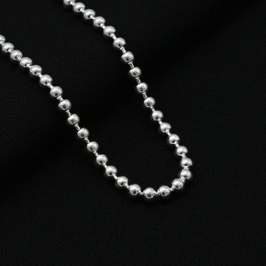 Elegant silver chain for boys featuring minimalist bead accents