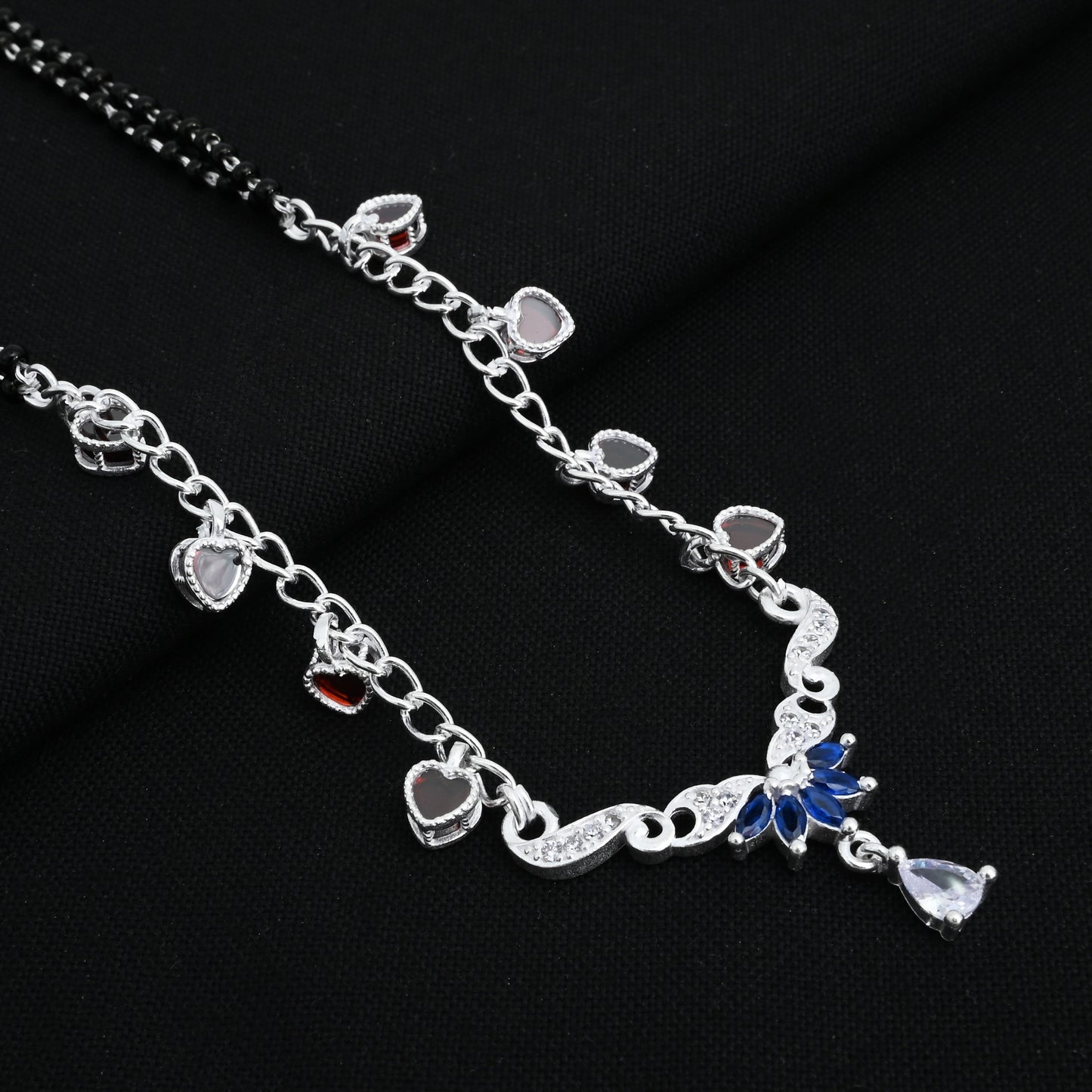 Timeless silver mangalsutra with black beads and a delicate heart motif