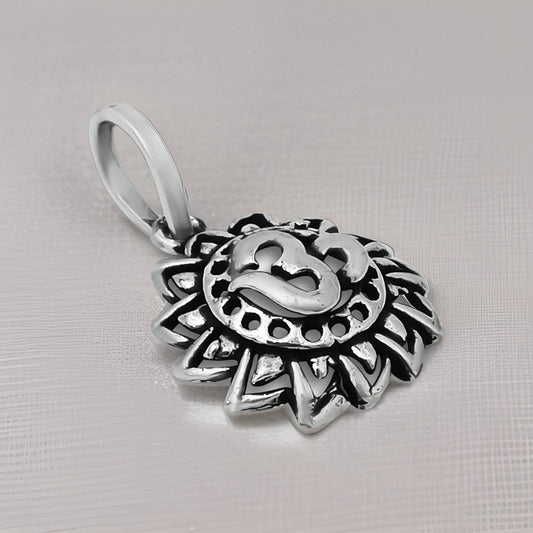 Elegant sterling silver pendant showcasing a center Om symbol surrounded by a Surya motif