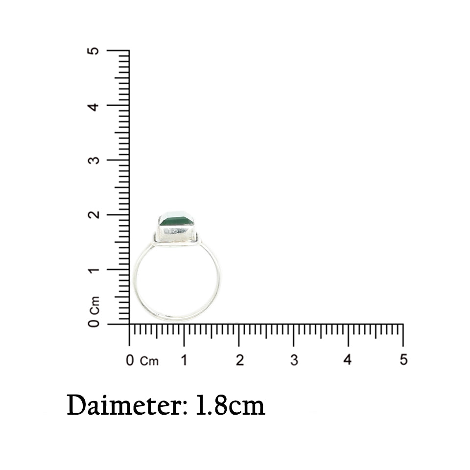 Silver ring with a stunning green rectangular stone, adding a pop of color and elegance.