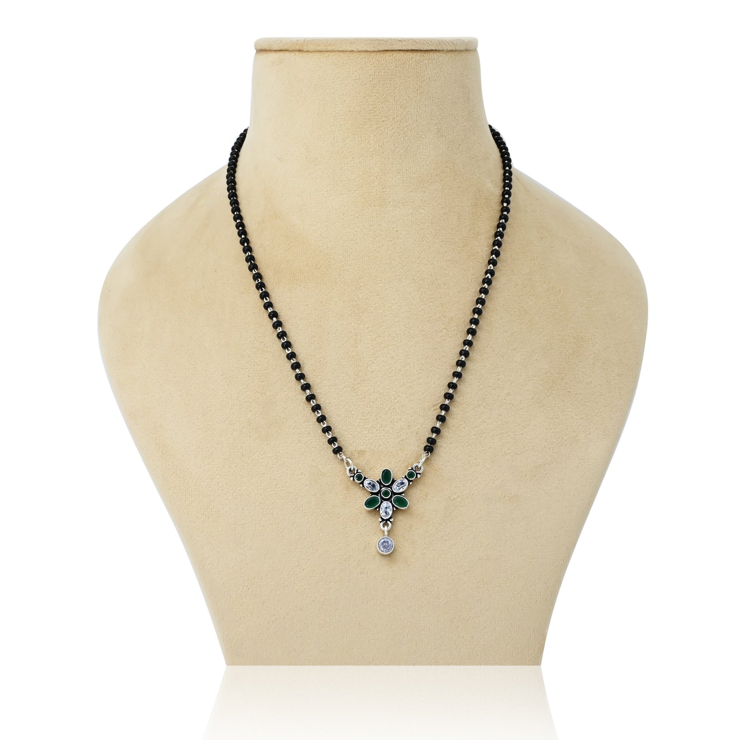 Sterling silver mangalsutra featuring both round and oval green gemstones for a unique design