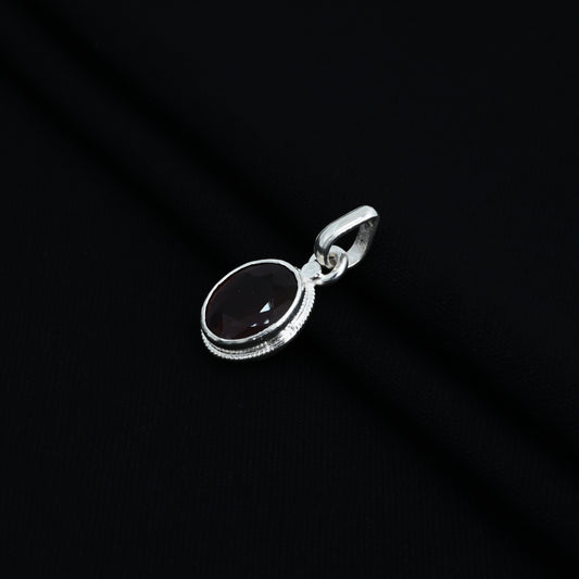 Stylish silver pendant for girls, showcasing a red oval gem at the center