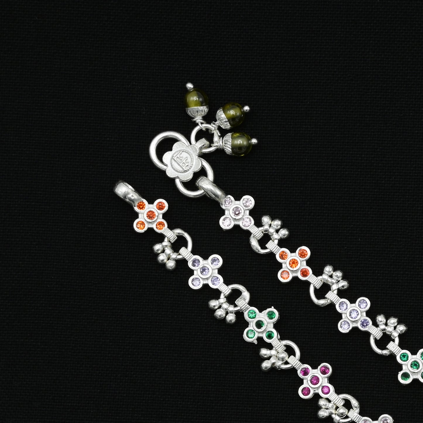 Elegant silver anklet with a floral motif, made from high-quality sterling silver