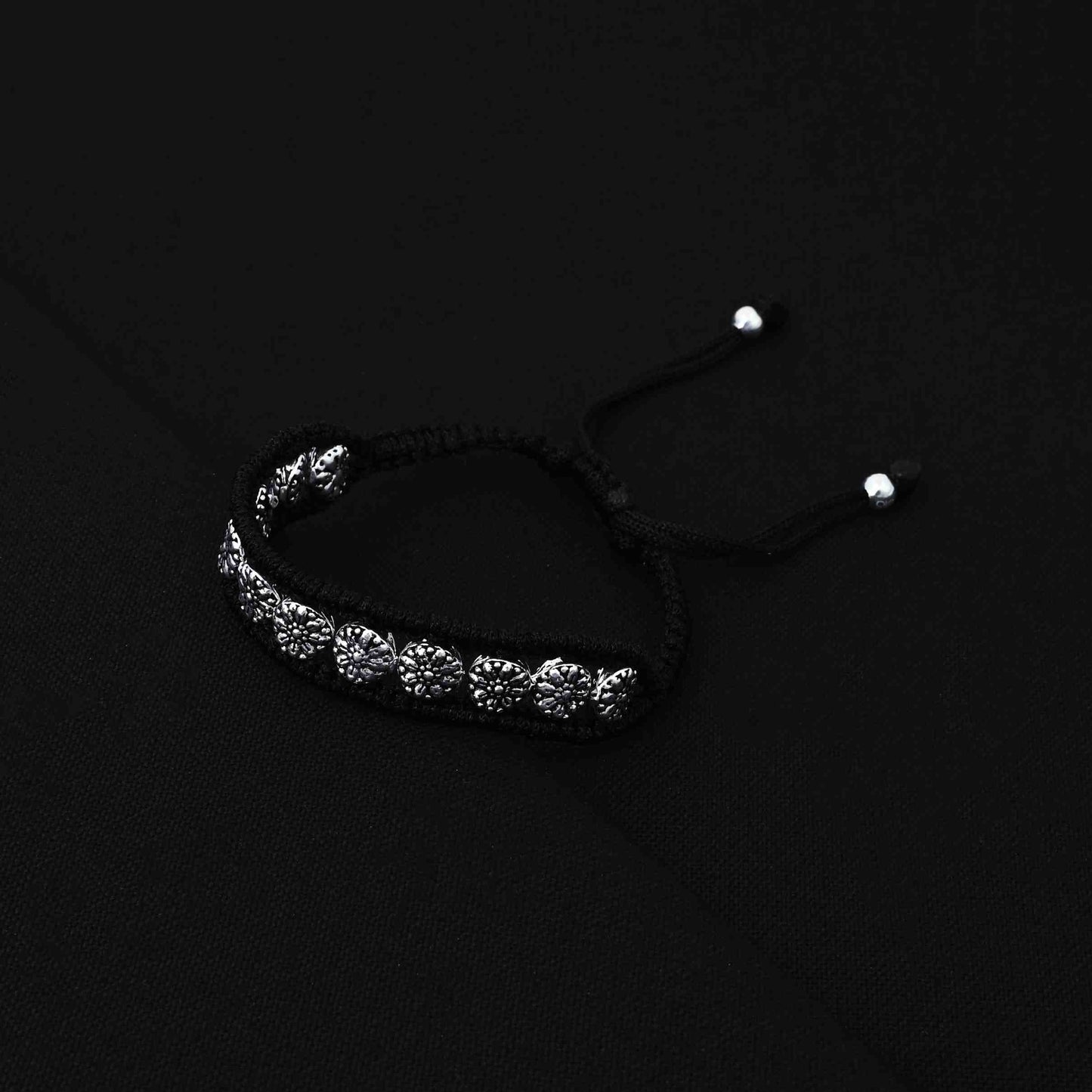Trendy silver bracelet for boys adorned with multiple flower motifs