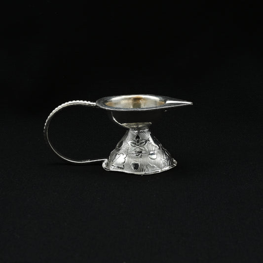 Handcrafted silver Aarti item designed for lighting during religious ceremonies