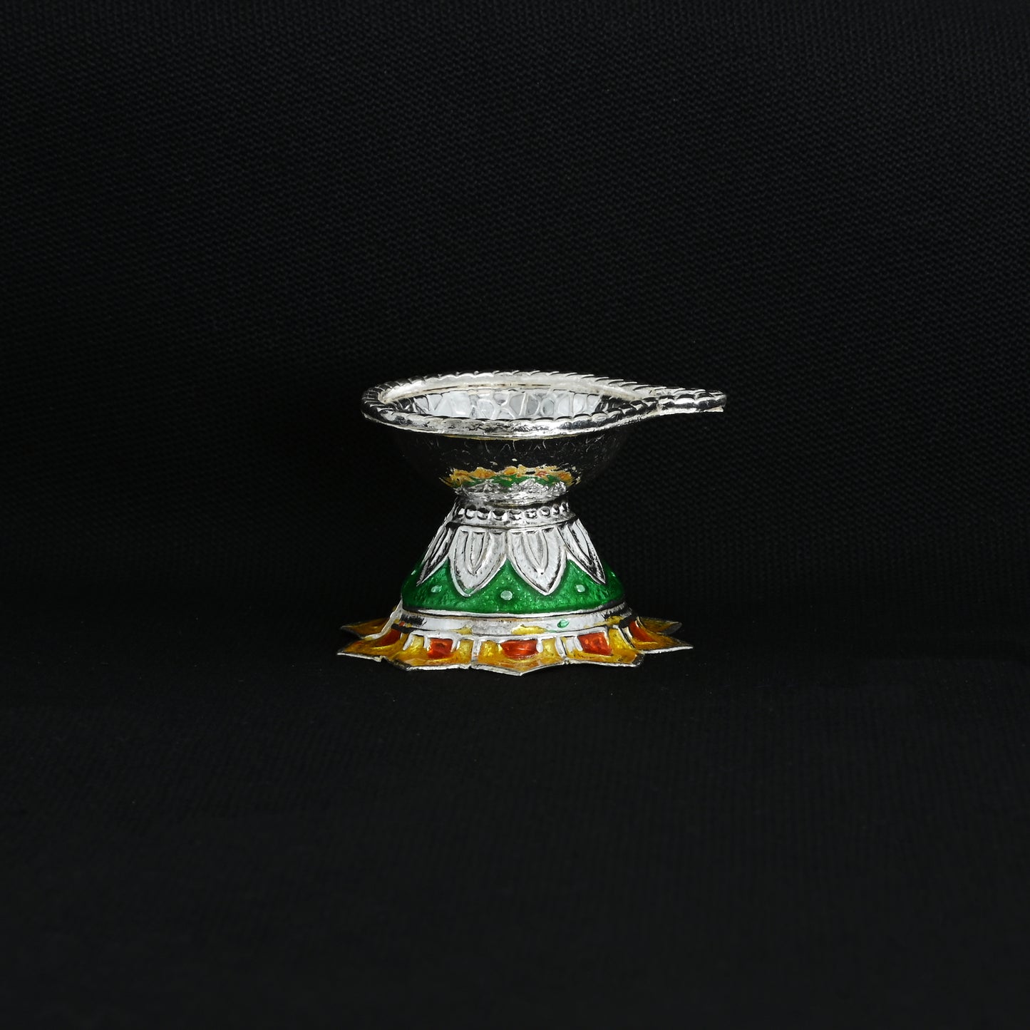 High-quality image of the silver deepak, beautifully designed to bring warmth and light to your worship