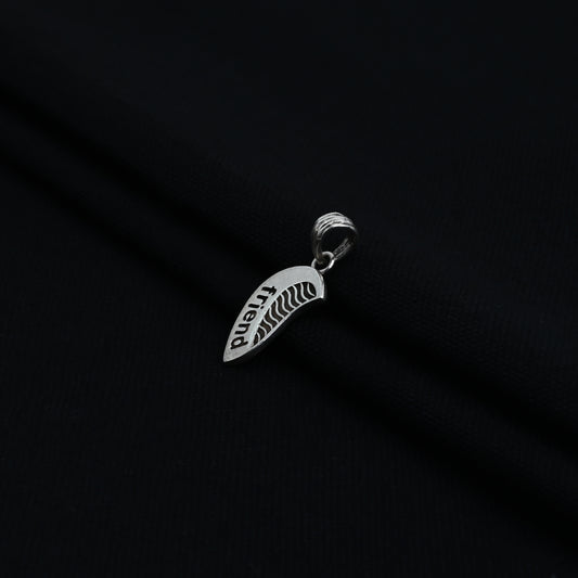 Charming silver pendant with 'Friend' written and a unique half-heart design for boys