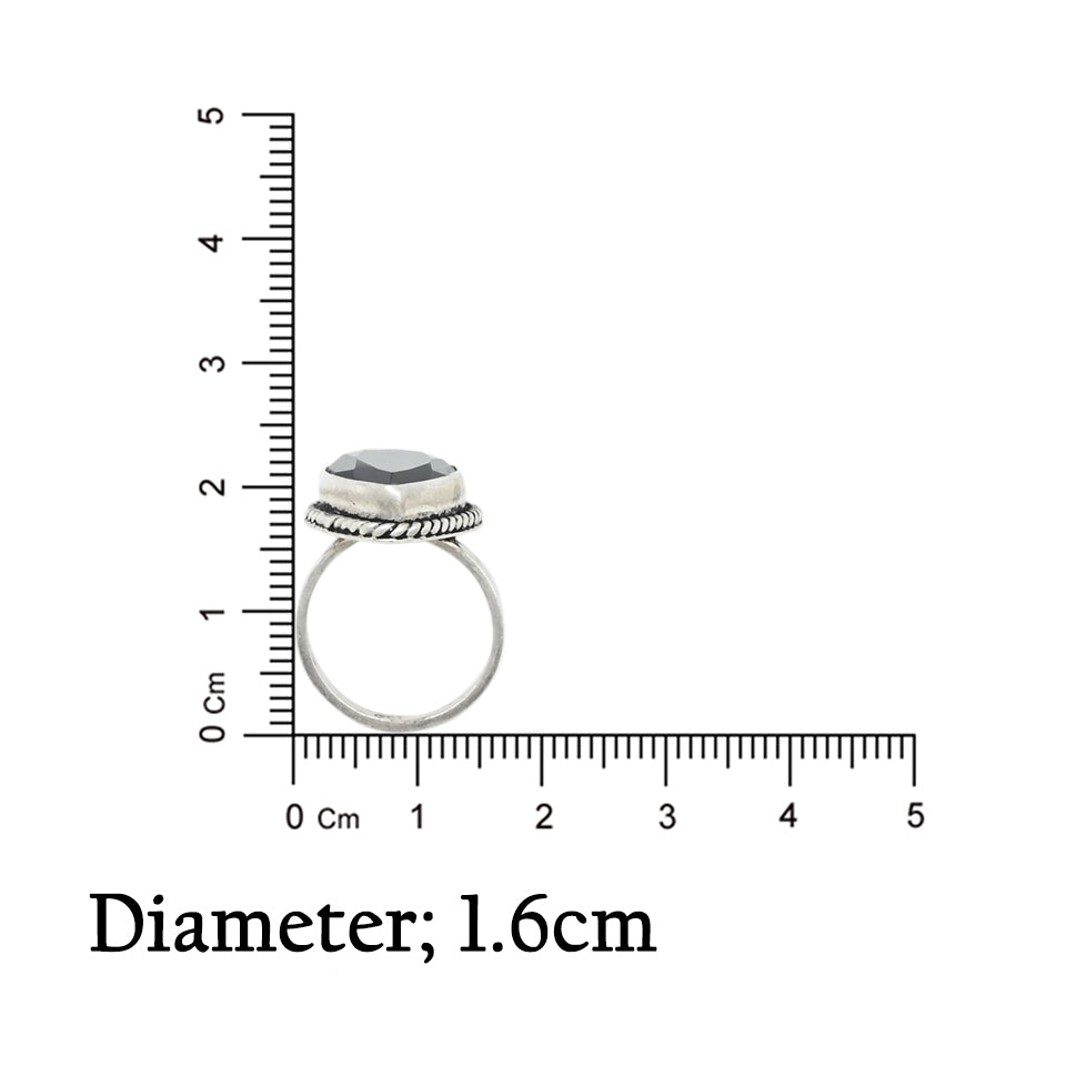 Silver ring with a polished black stone, adding a modern and refined touch