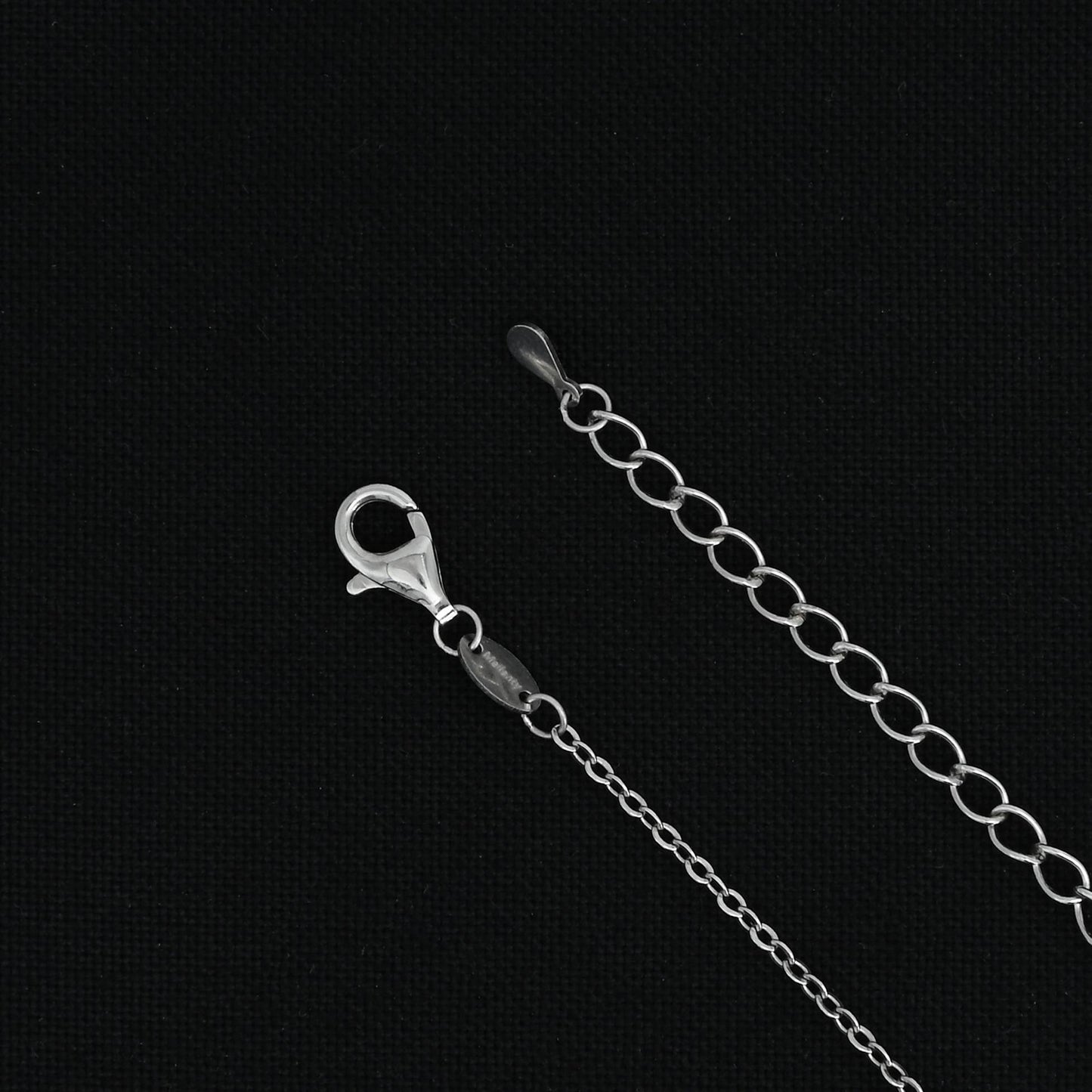 Silver chain with a charming duck-shaped pendant.