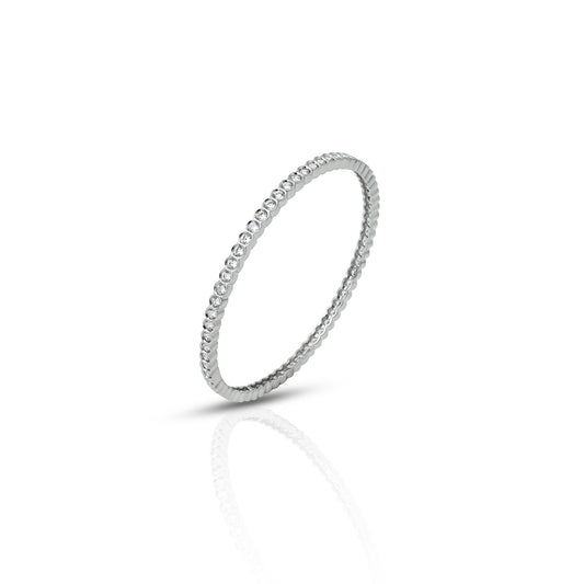 Stylish silver bangle with CZ stones and a sleek, slim design, perfect for a delicate and refined accessory.