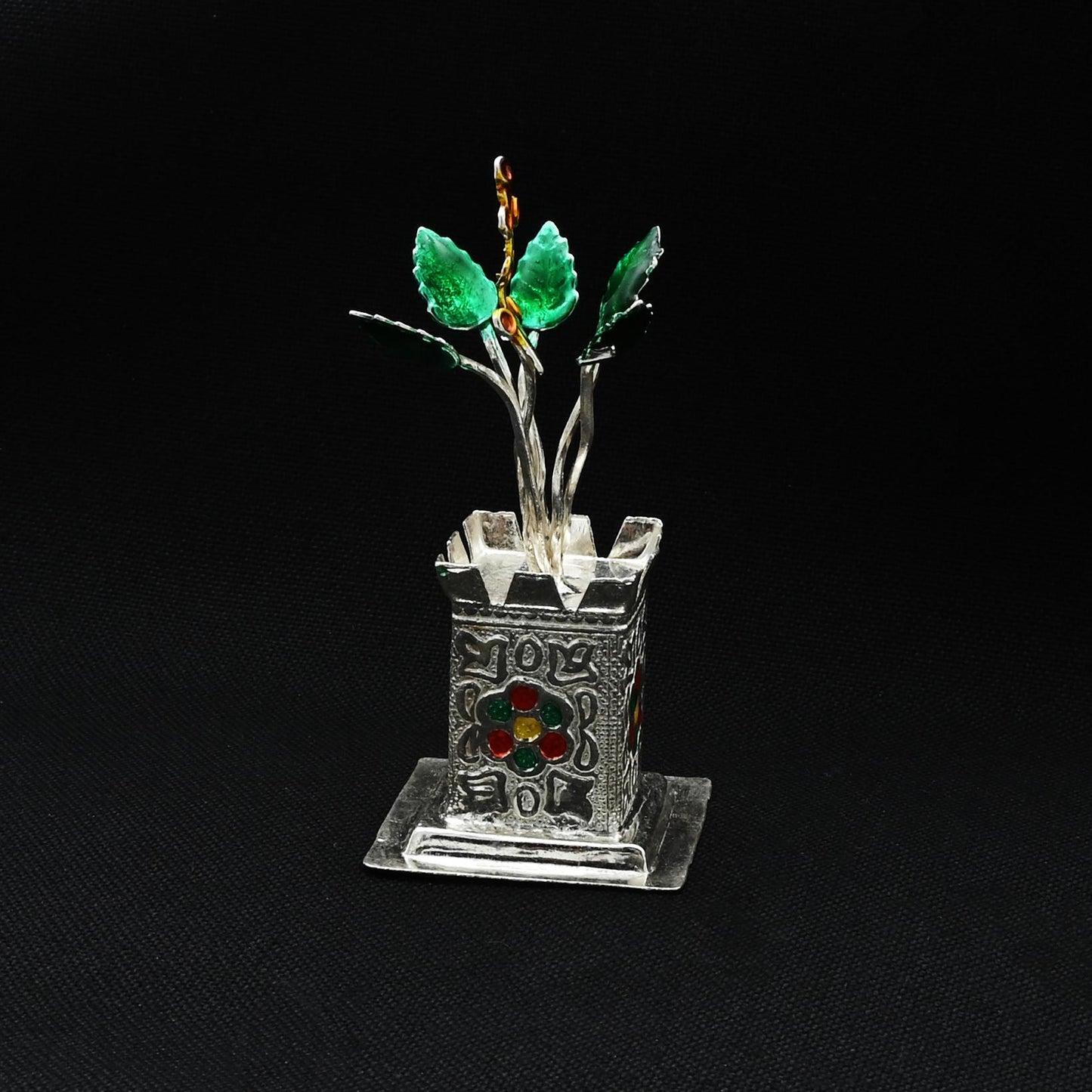 Handcrafted silver Tulsi plant, symbolizing purity and sacredness in religious rituals