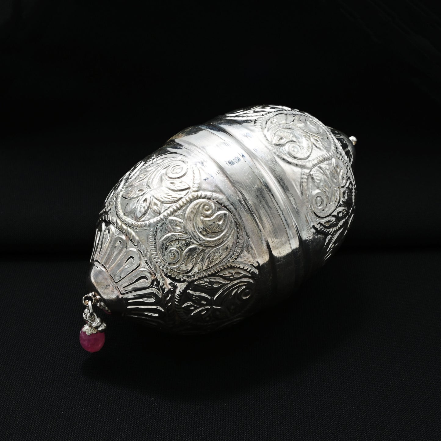 Elegant silver nariyal for marriage, ideal for auspicious ceremonies and wedding celebrations.