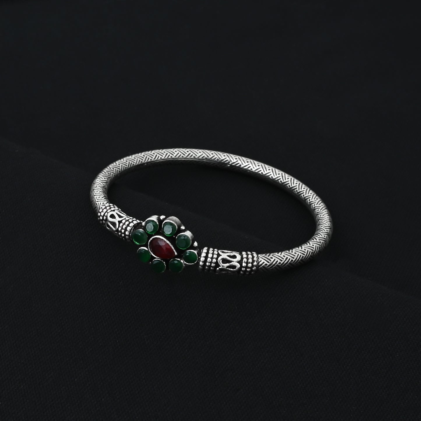 Stylish silver boys' kada with a leaf motif and clean, simple lines