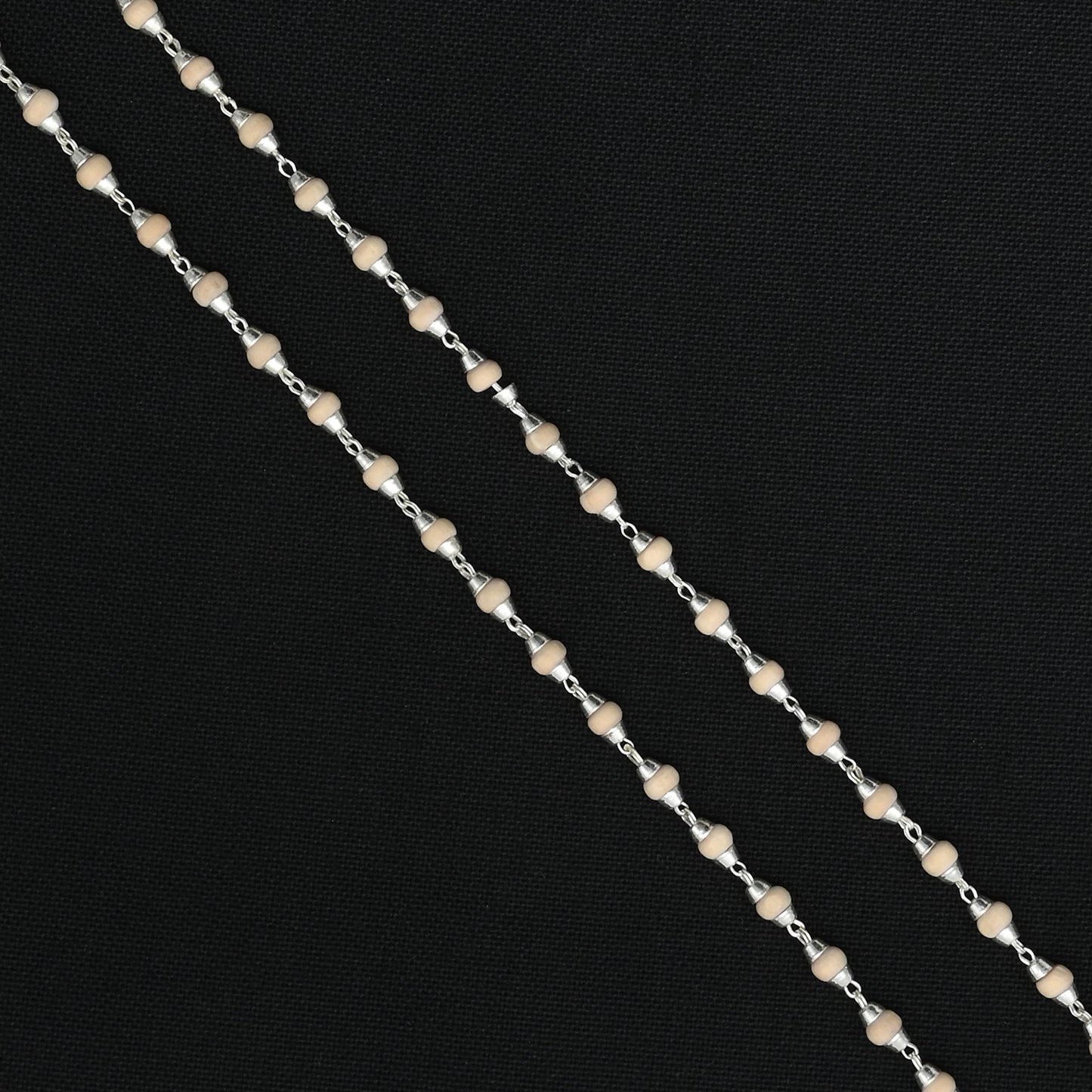 Traditional handcrafted spiritual Tulsi mala in silver by Khushbu Jewellers, perfect for meditation and prayer.