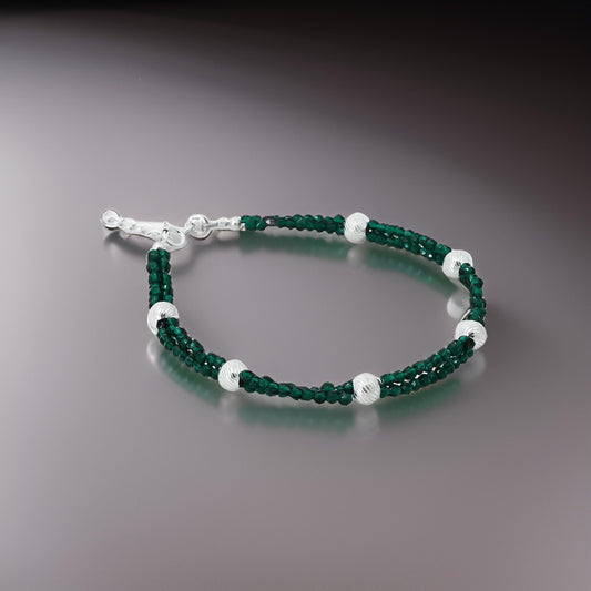 Stylish silver bracelet for boys with striking green bead accents