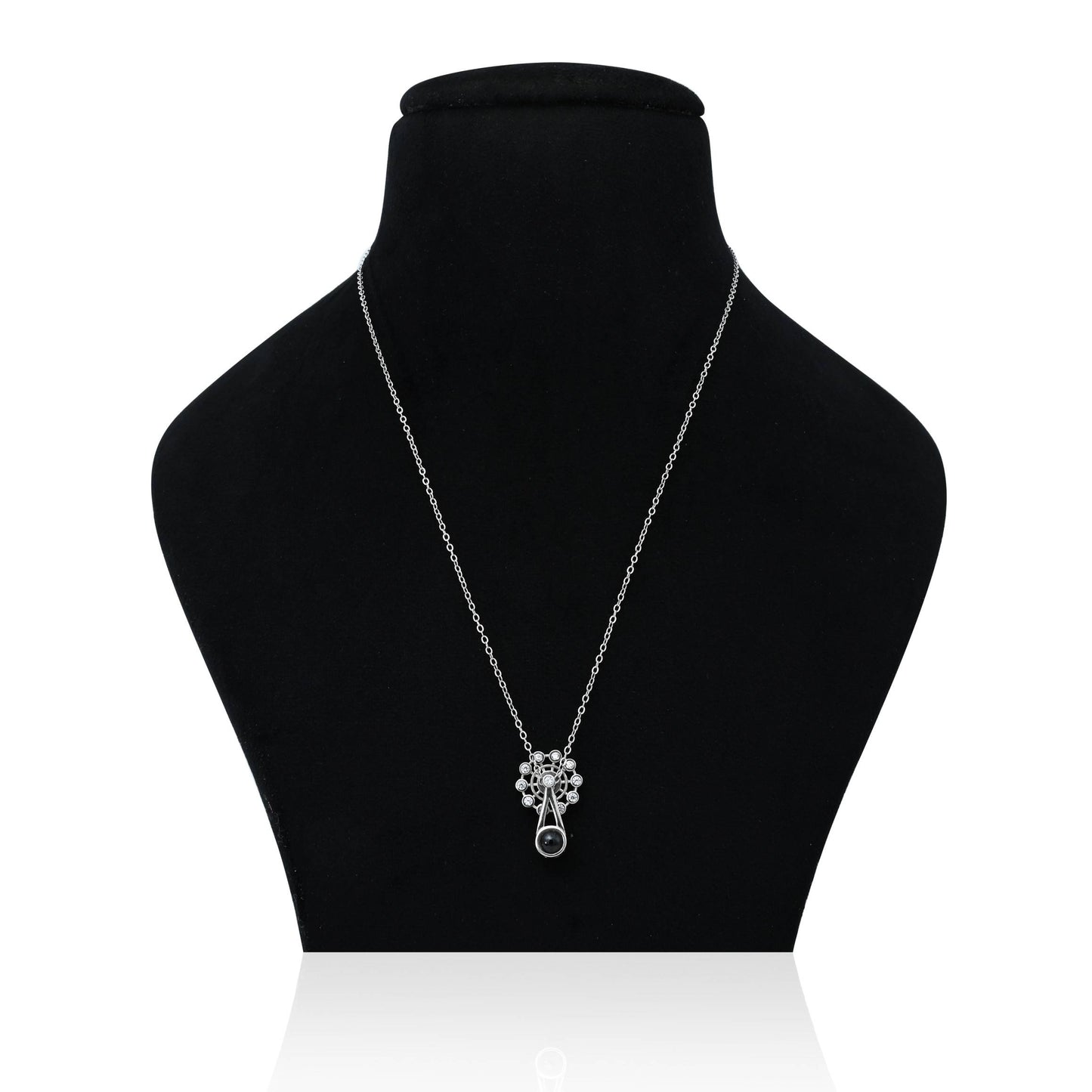 Silver chain with a sleek pendulum design pendant, front view.