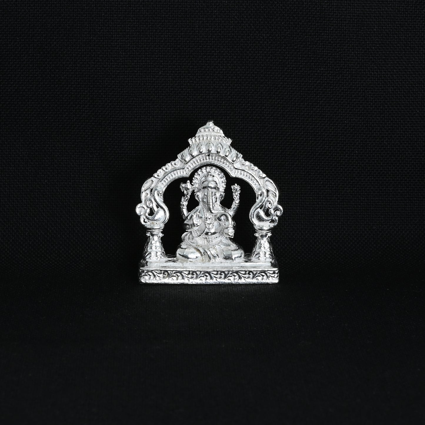 Premium silver Ganpati idol, symbolizing prosperity and wisdom.