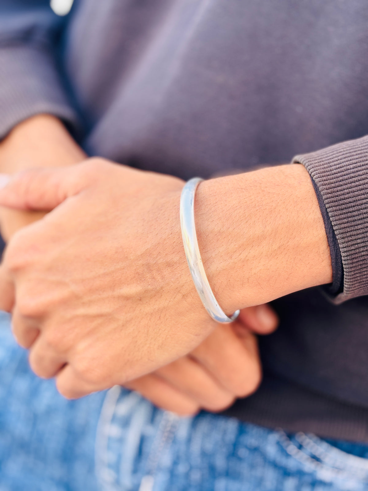 Simple plain design silver kada for boys with a sleek finish.
