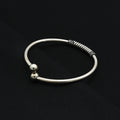 Elegant silver kada with a distinct and casual design