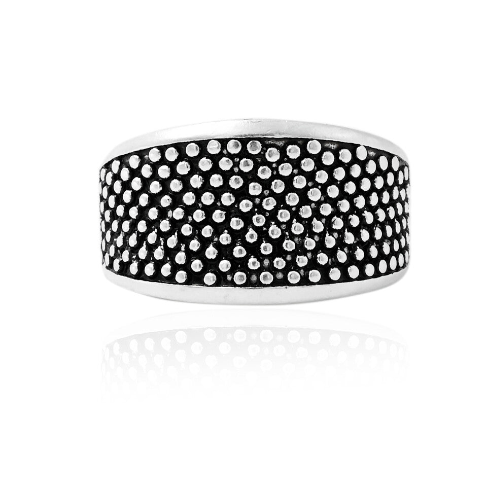 Stylish silver ring adorned with a smooth black stone, showcasing a modern design.