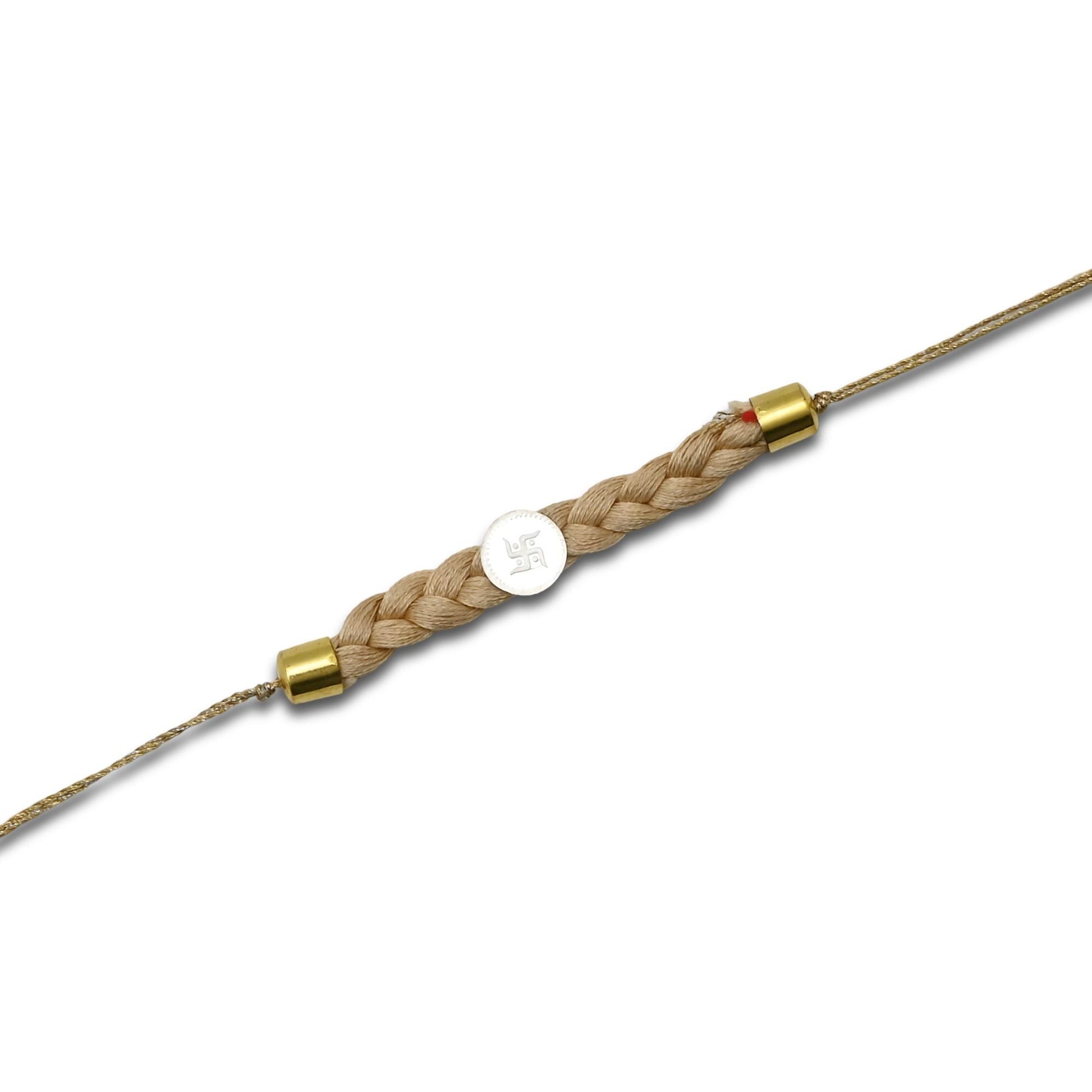 Boys' Rakhi featuring a silver Swastik centerpiece with a cream tangle Moli.