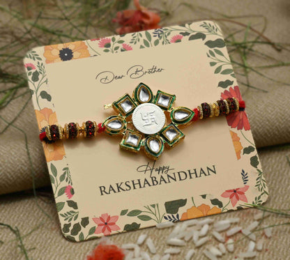 Silver center Swasthik flower design with multi-color beads, perfect Rakhi for boys.