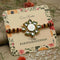 Silver Center Swasthik Flower Design with Multi Color Beads Rakhi for Boys