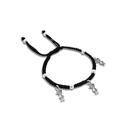 Charming oxidized silver anklet with 'Boy Charms' on black thread.