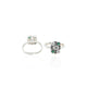 Handcrafted silver toe rings adorned with exquisite green stones for a sophisticated style