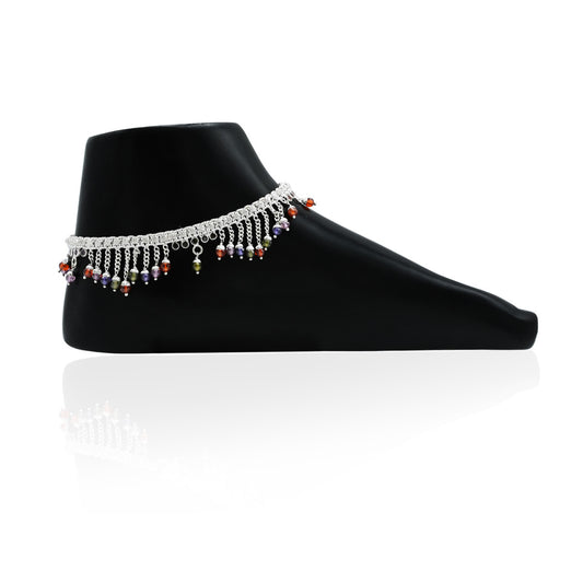 Silver anklet featuring an up-and-down arrangement of colorful gemstones for a dynamic look.