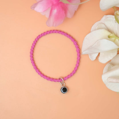Bracelet with a bold black Evil eye charm
