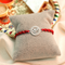 Silver Rakhi with Ram Charm