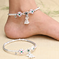 Sterling silver kada payal adorned with multiple stones and ghungroo accents.