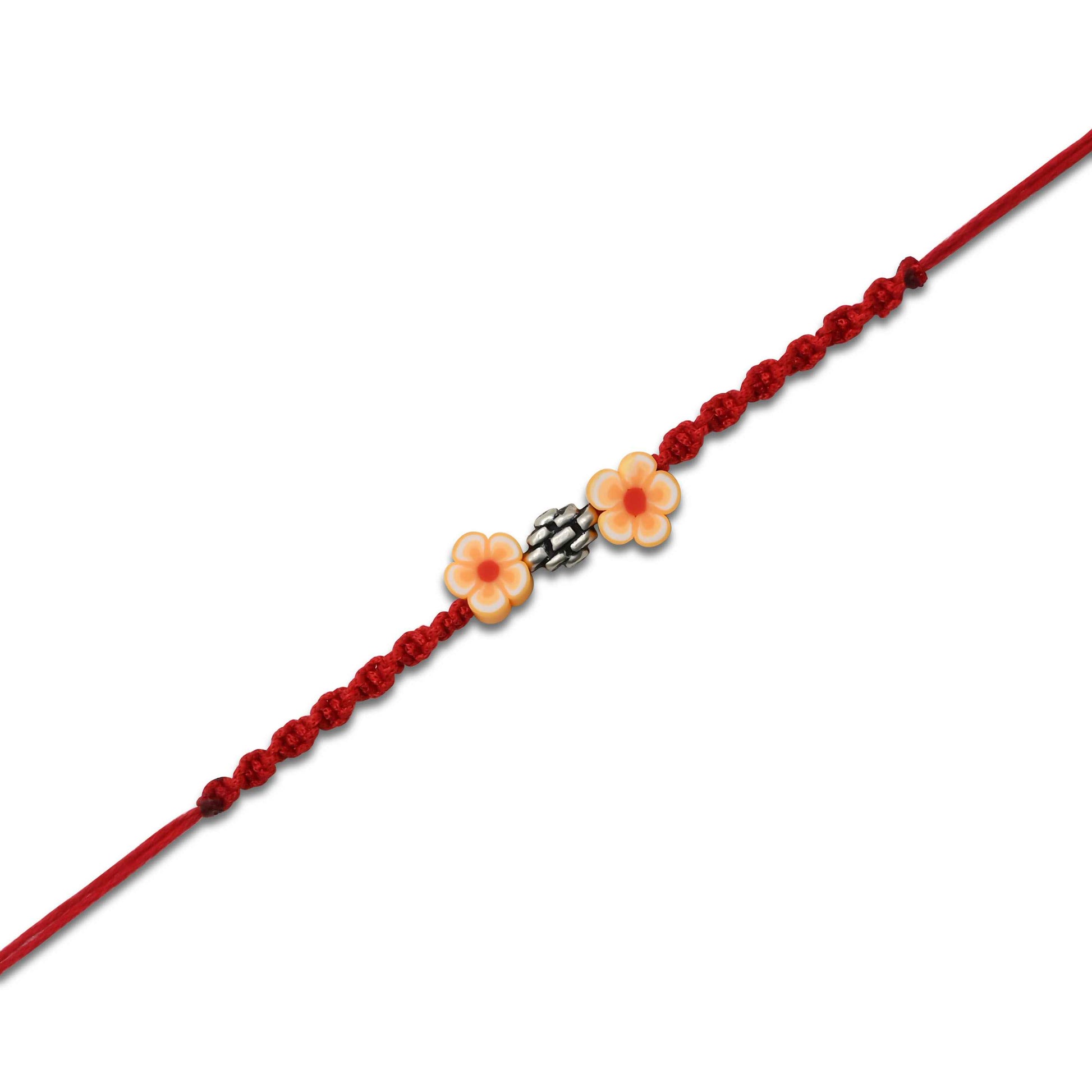 Boys' Rakhi featuring a silver bead centerpiece and vibrant orange flowers.