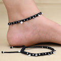 Silver dhaga payal featuring round American diamond accents