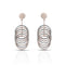 Layered Teardrop Silver Dangle Earrings with a Unique Textured Pattern